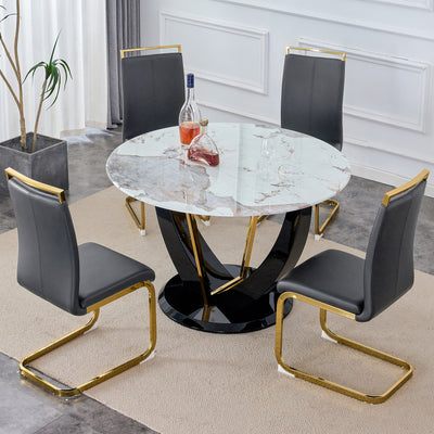 Table and chair set. 1 table and 4 chairs. Round Pandora style stone burning tabletop with black MDF legs. Paired with 4 chairs with PU dark gray cushions and golden legs.908  1162