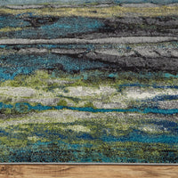 7' X 10' Blue Green And Taupe Stain Resistant Area Rug