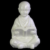 Buddhist Acolyte Figurine Studying a Reading Material - White