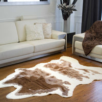 5.25' X 7.5' Brown And Natural Faux Hide Area Rug