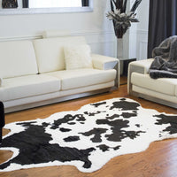 5.25' X 7.5' Sugarland Black And White Faux Hide Area Rug