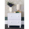 White Finish Nightstand With 2 Drawers On Metal Glides.