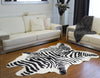 5.25' X 7.5' Zebra Black And White Faux Hide Area Rug