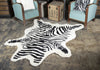 5.25' X 7.5' Zebra Black And White Faux Hide Area Rug