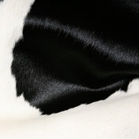 5' X 7' Black And White Cowhide Area Rug