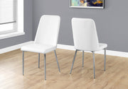 Two 37" Leather Look, Foam, and Chrome Metal Dining Chairs