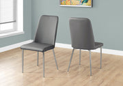 Two 37" Grey Leather Look, Foam, and Chrome Metal Dining Chairs