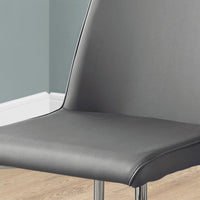 Two 37" Grey Leather Look, Foam, and Chrome Metal Dining Chairs