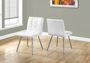 Two 31.5" Leather Look, Foam, Polyurethane, and Chrome Metal Dining Chairs