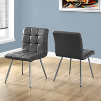 Two 31.5" Grey Leather Look, Foam, Polyurethane, and Chrome Metal Dining Chairs