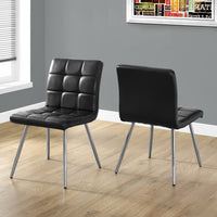 Two 31.5" Black Leather Look, Foam, Polyurethane, and Metal Dining Chairs