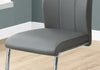 Two 77.5" Grey Leather Look, Chrome Metal, and Foam Dining Chairs