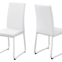 Two 38" White Leather Look, Foam, and Metal Dining Chairs