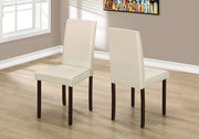 Two 36" Ivory  Leather Look, Solid Wood, Foam, and MDF Dining Chairs