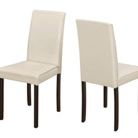 Two 36" Ivory  Leather Look, Solid Wood, Foam, and MDF Dining Chairs