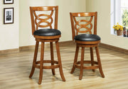 Two 42" Oak and Black Solid Wood, Foam, MDF, and Veneer Swivel Barstools