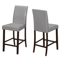 Two 40" Grey Leather Look, Solid Wood, and MDF Counter Height Dining Chairs