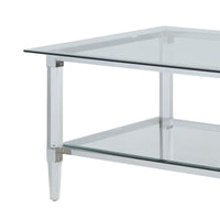 Metal Accented Glass Top Coffee Table with Open Shelf and Acrylic Legs, Silver and Clear