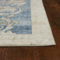 7'7" x 10'10" Polypropelene Teal Area Rug