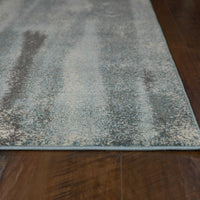 7'10" x 10'10" Polypropelene Teal Area Rug