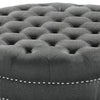 Fabric Upholstered Round Tufted Ottoman with Wood Legs, Gray and Black