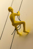 6" x 3" x 3" Resin Yellow Climbing Man