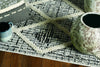 7'x10' Ivory Hand Woven Wool And Jute Indoor Area Rug