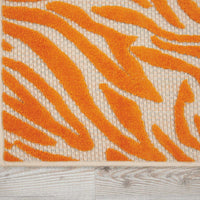 5’ x 8’ Orange Zebra Pattern Indoor Outdoor Area Rug