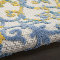 7’ x 10’ Ivory and Blue Indoor Outdoor Area Rug