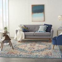 7’ x 10’ Ivory and Light Blue Distressed Area Rug