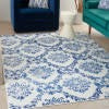 6’ x 9’ Ivory and Navy Damask Area Rug