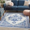 4’ x 6’ Ivory and Blue Persian Medallion Area Rug