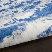 6’ x 9’ Ivory and Navy Oceanic Area Rug