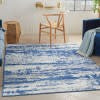 6’ x 9’ Ivory and Navy Oceanic Area Rug