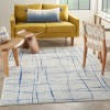 6’ x 9’ Ivory and Blue Irregular Grids Area Rug