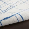 6’ x 9’ Ivory and Blue Irregular Grids Area Rug