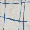 6’ x 9’ Ivory and Blue Irregular Grids Area Rug