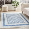 6’ x 9’ Ivory and Blue Geometric Area Rug