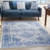 6’ x 9’ Ivory and Navy Geometric Area Rug