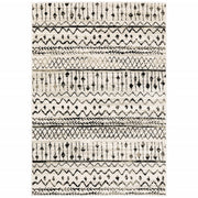 5’ x 7’ Ivory and Black Eclectic Patterns Indoor Area Rug