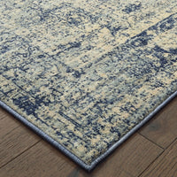 7’x10’ Ivory and Blue Oriental Area Rug