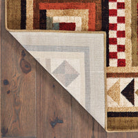7’x9’ Brown and Red Ikat Patchwork Area Rug