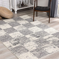 7’ x 9’ White and Gray Checkered Area Rug