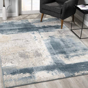 2’ x 4’ Cream and Blue Abstract Patches Area Rug