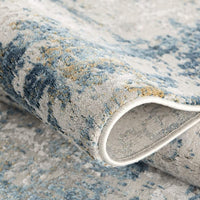 4’ x 6’ Ivory and Blue Abstract Distressed Area Rug