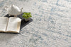 8’ x 11’ Ivory and Blue Abstract Distressed Area Rug