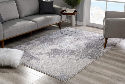 2’ x 4’ Cream and Gray Faded Filigree Area Rug