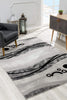 7’ x 9’ Gray and Black Abstract Waves Area Rug