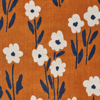 8’ x 9’ Orange and Ivory Flower Field Area Rug