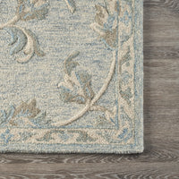 7’ x 9’ Blue and Cream Filigree Area Rug